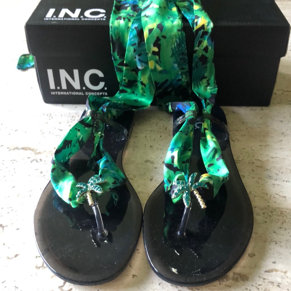 INC Black sandals with ribbon and tie up. Palm tree detailing. Brand new Size 9.